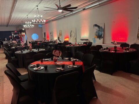 Black-and-red themed celebration in the Atrium